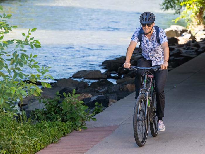 CU Denver student riding back in Denver