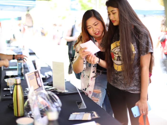 Students at sorority tabling event