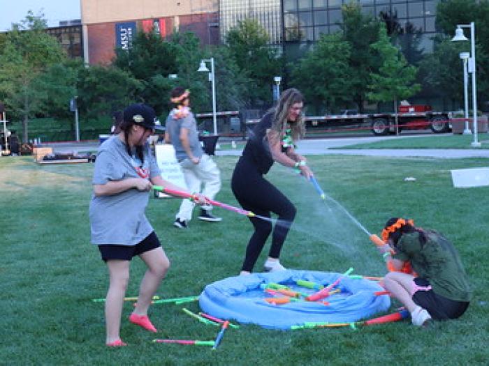students-having-water-fight