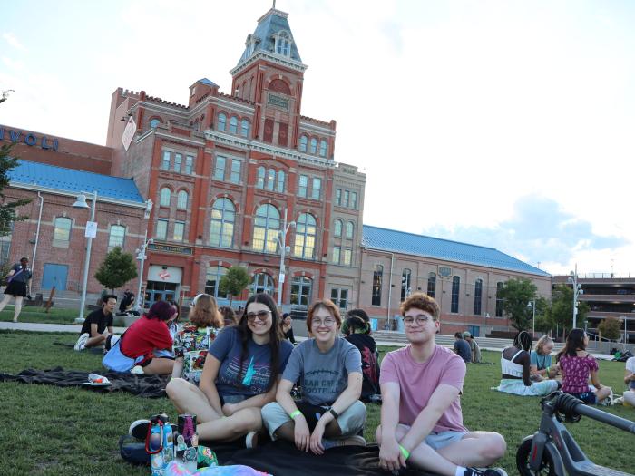 students-sitting-outside-of-tivoli