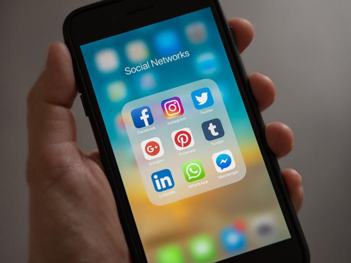 phone with social app icons