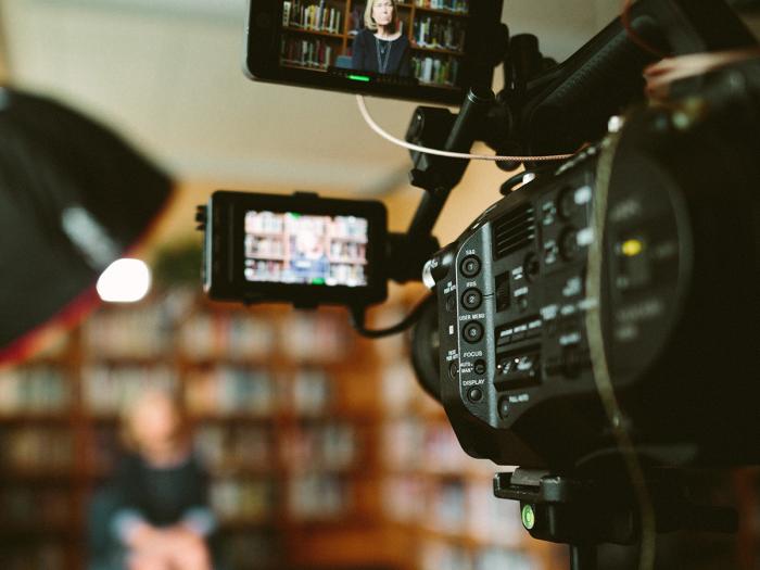 videographer filming media expert