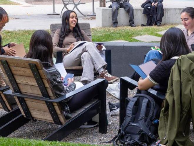 Circle of CU Denver students outside on campus