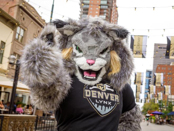 CU Denver mascot Milo giving thumps up