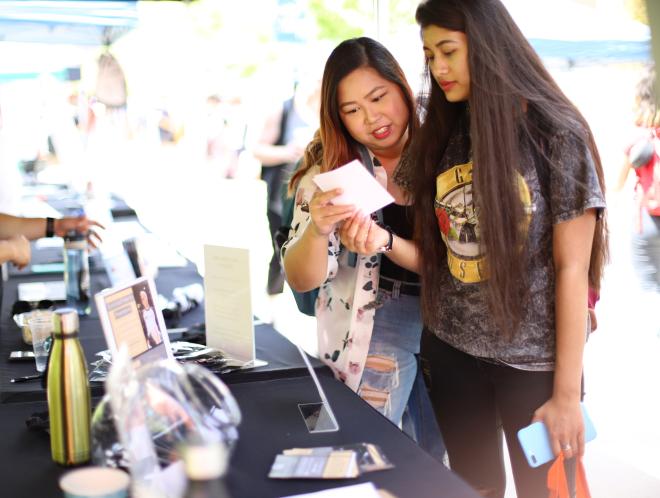 Students at sorority tabling event