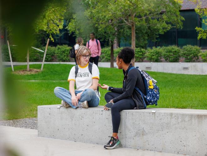 Students sitting outside