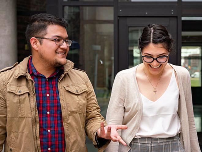 Three CU Denver students leaving building