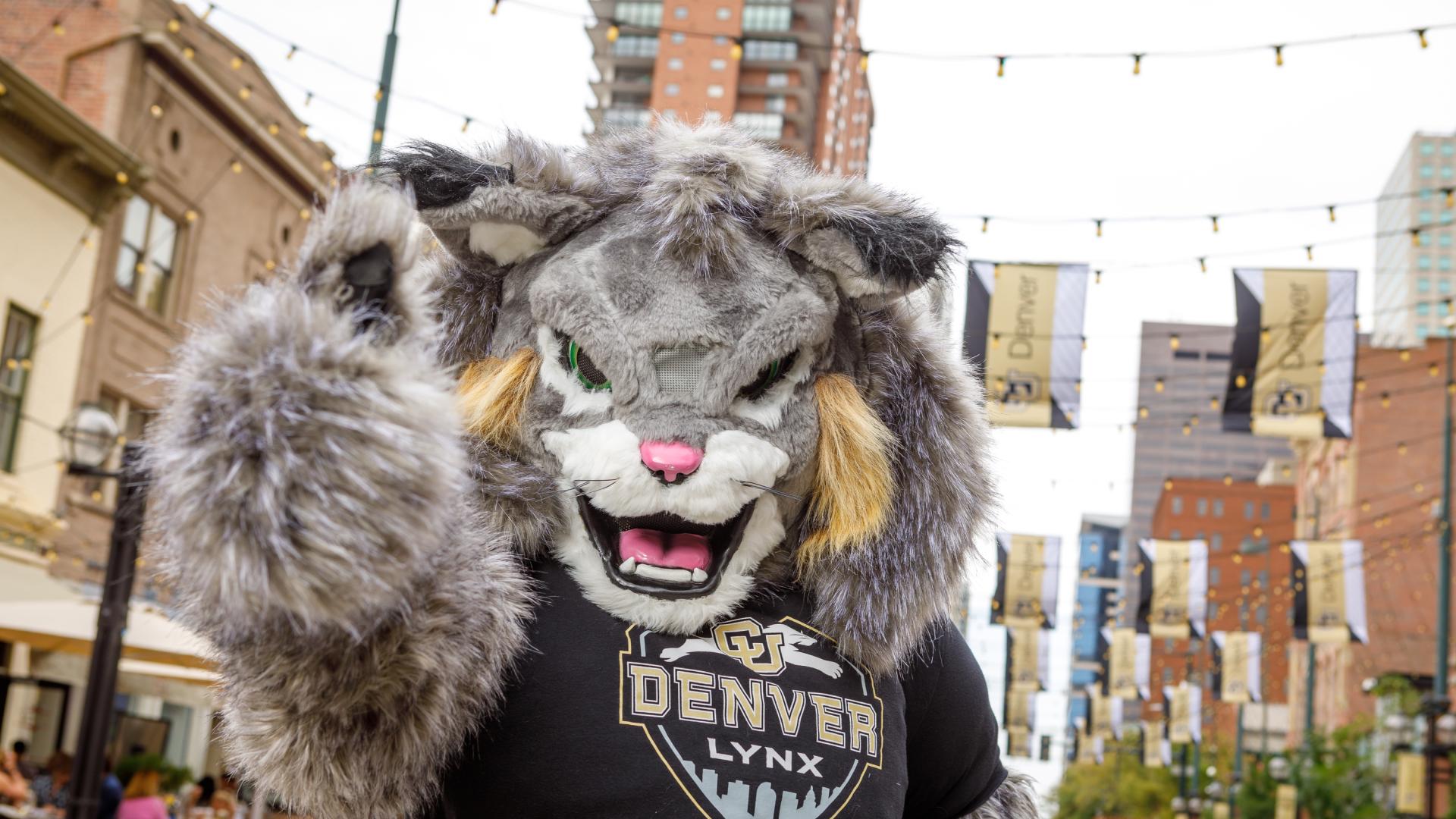 CU Denver mascot Milo giving thumps up