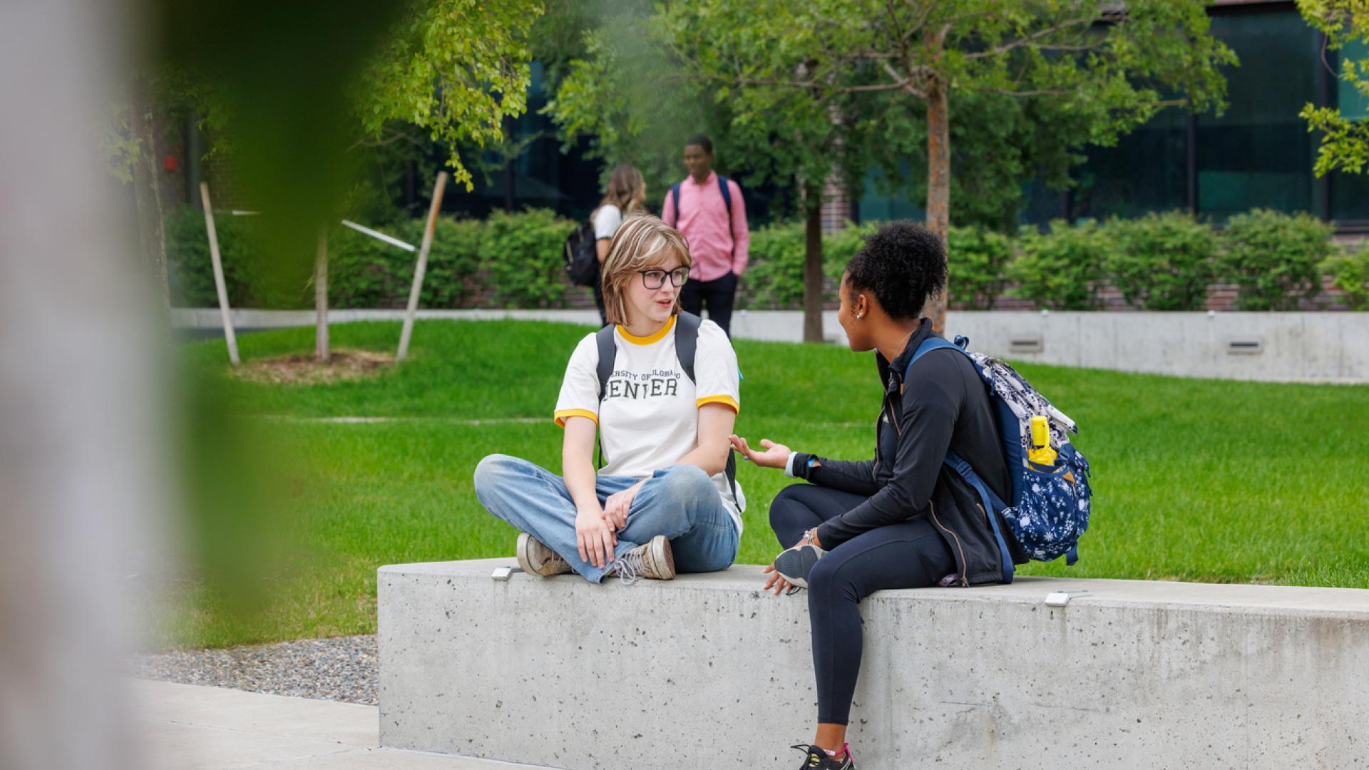 Students sitting outside