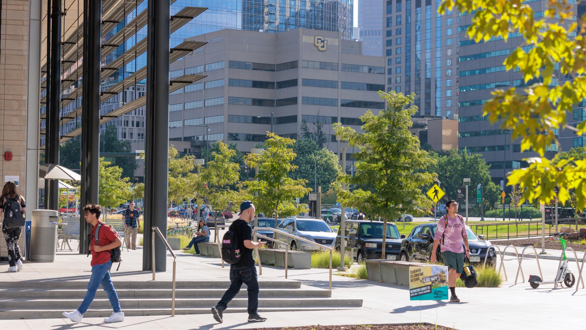 Students walking in front of Student Commons Building