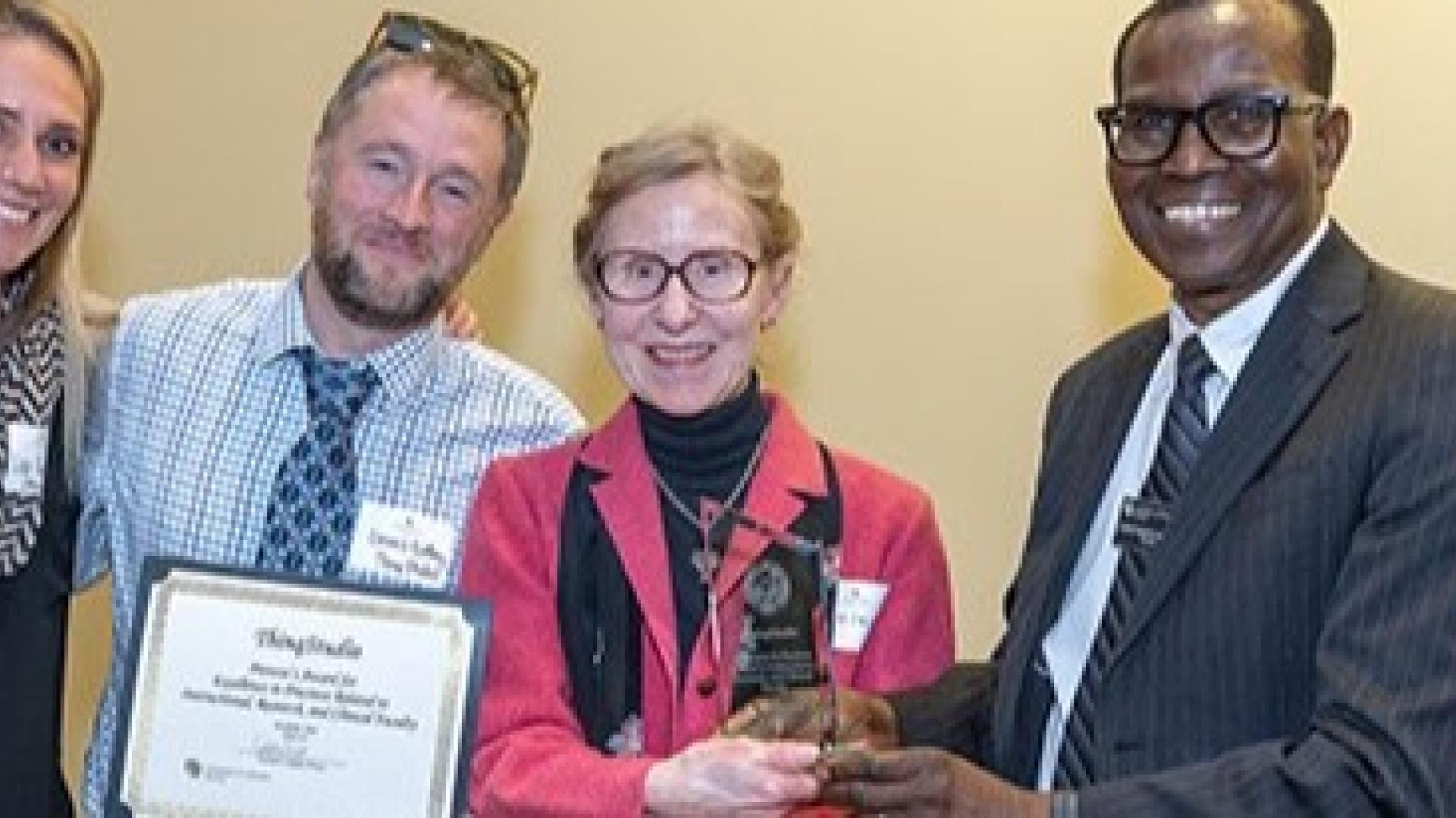 Faculty member receiving award