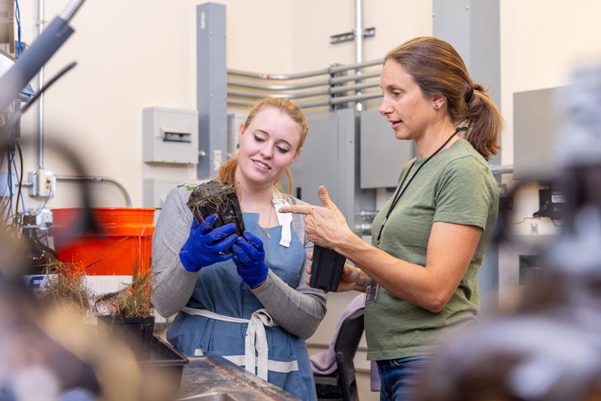 CU Denver student and professor doing horticulture