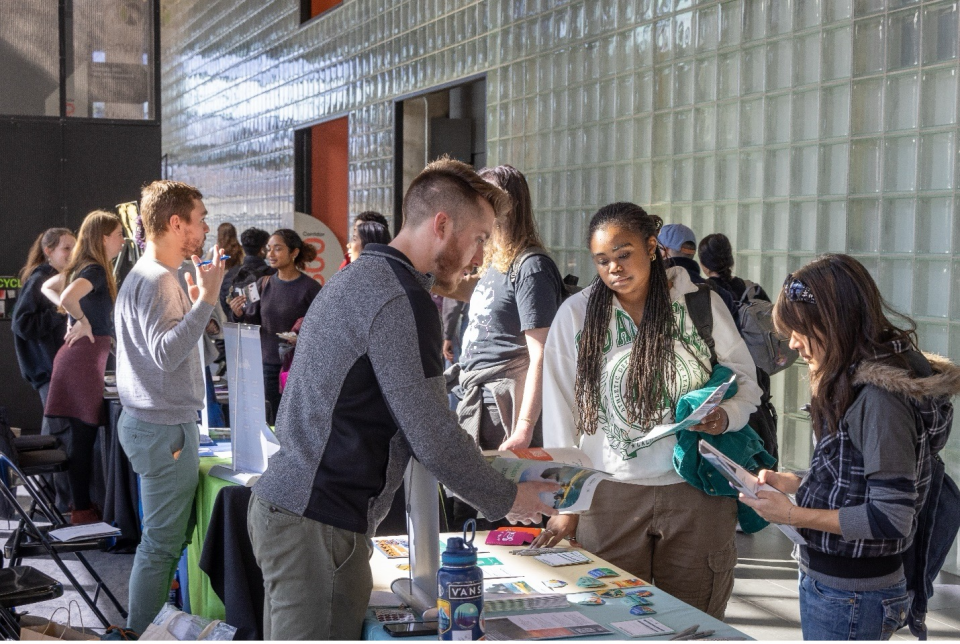 Study abroad program representatives share program information with CU Denver students at the spring 2025 study abroad fair. 
