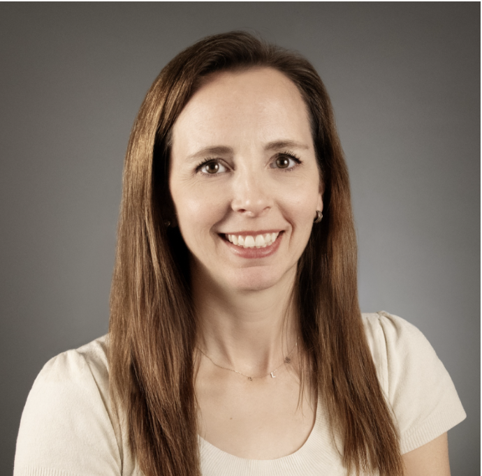 A headshot of Kelly A. McCusker, MSLIS, MPA.