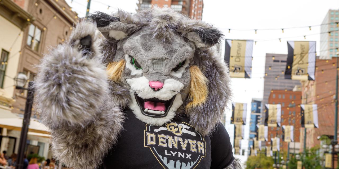 CU Denver mascot Milo giving thumps up