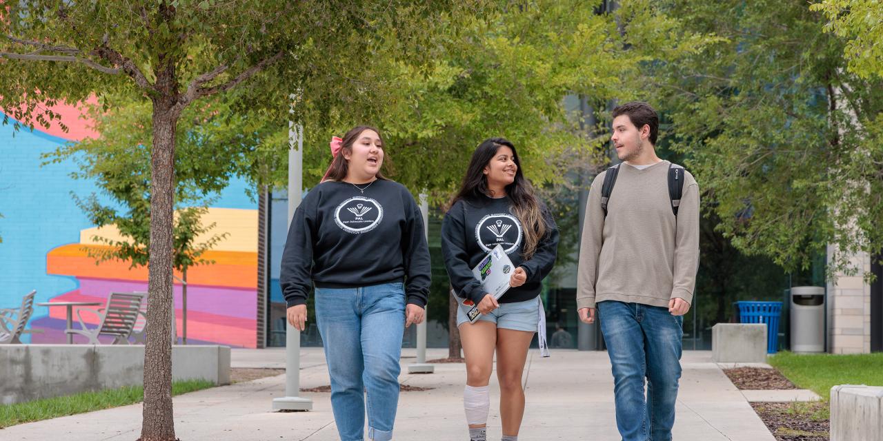 Three CU Denver students walking on campus