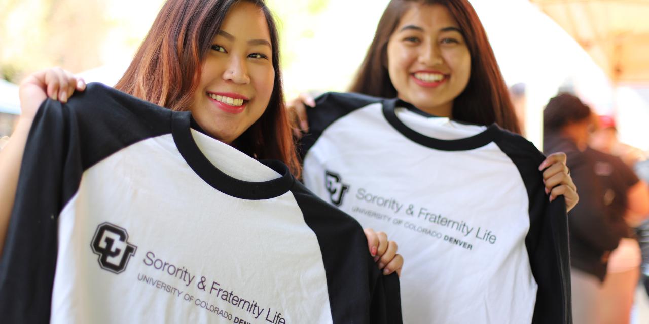 Students with sorority life merch