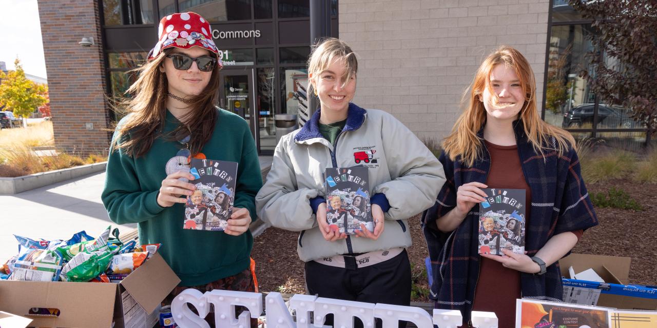 students-handing-out-sentry-print-issues