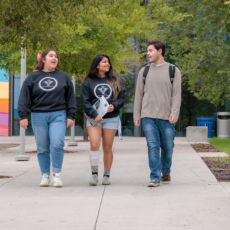 Three CU Denver students walking on campus