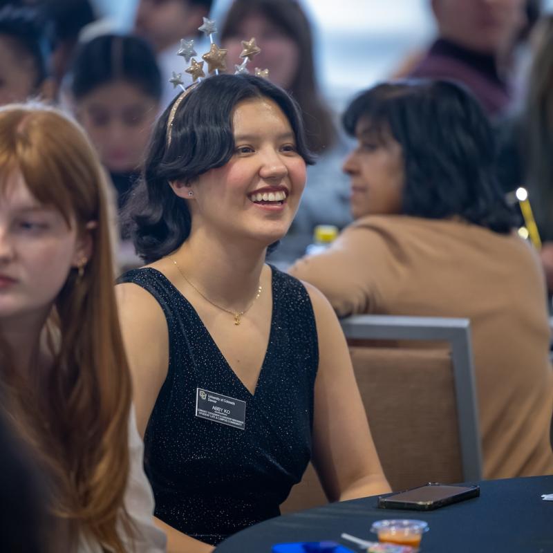 CU Denver student smiling in a crowd