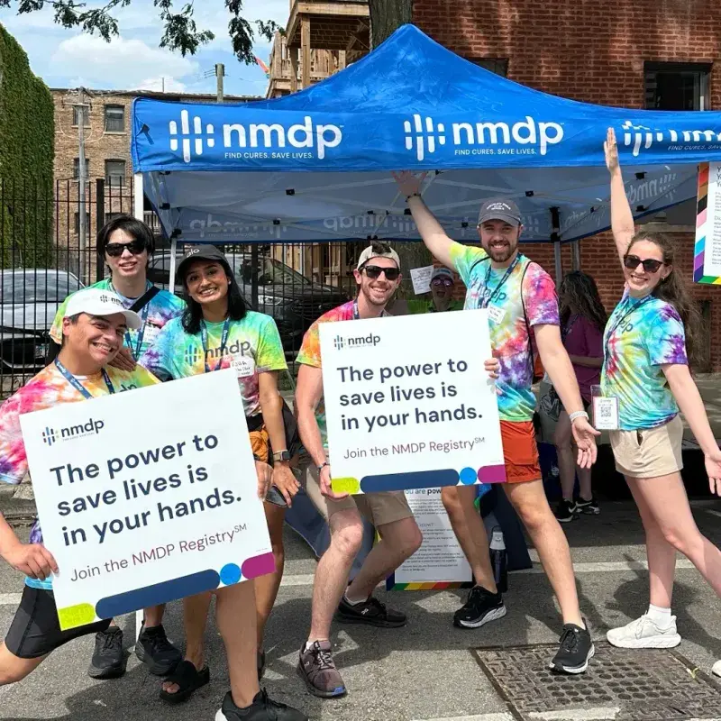 volunteers-holding-signs-NMDP